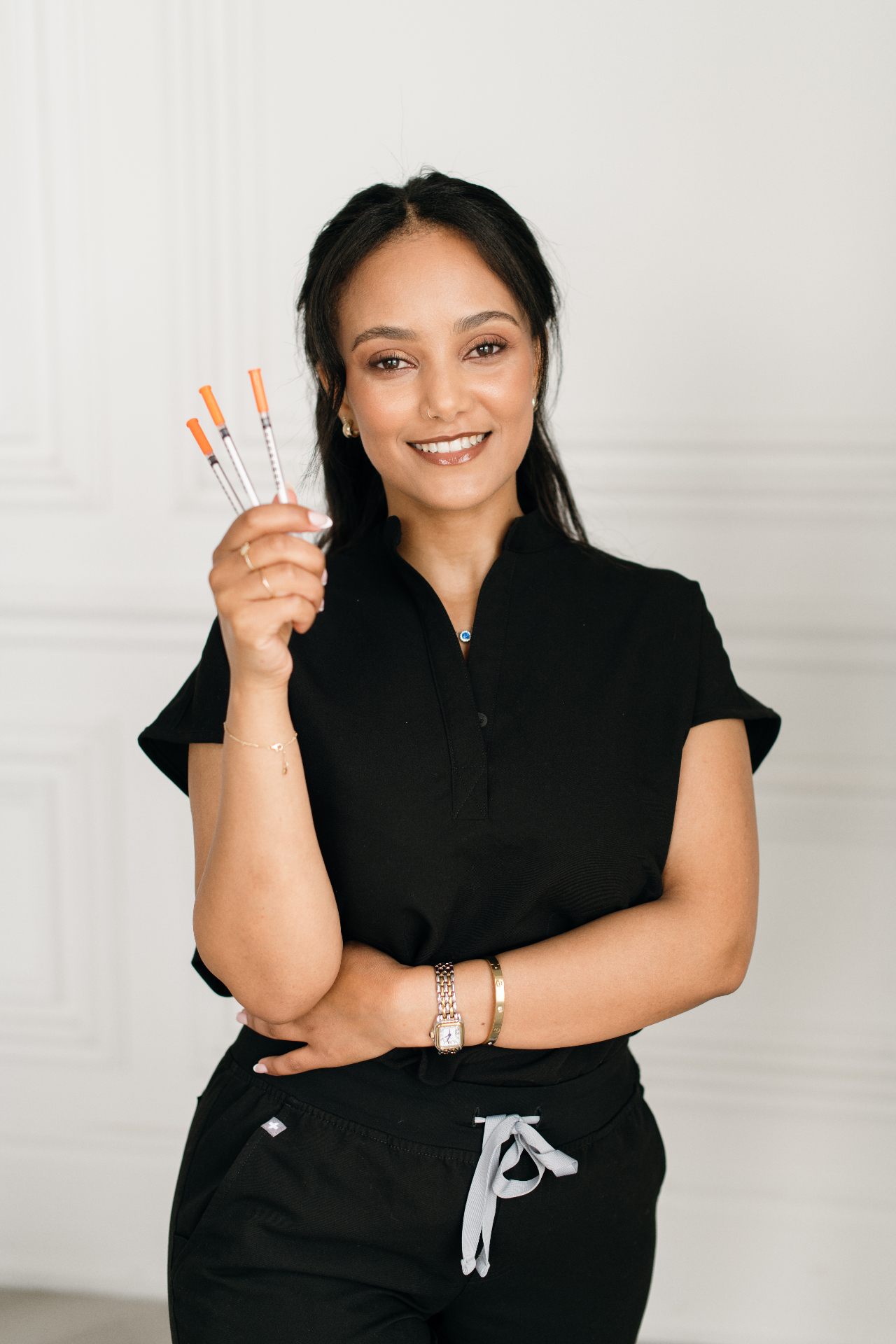 Lena preparing injectables in her Toronto studio